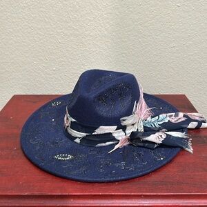 New. Absolutely gorgeous adjustable hat. So much detailing that was added.